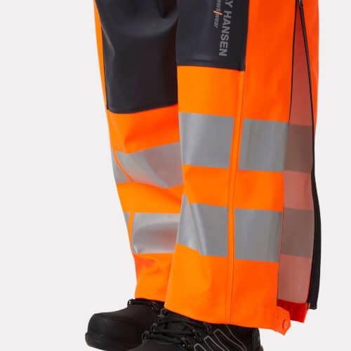 Helly Hansen 70596 Alna 2.0 fluo oranje regenbroek met bretels ykk rits met drukknoop