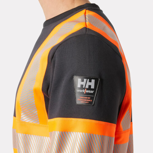 Helly Hansen 79272-269 ICU oranje sweater logo op schouder
