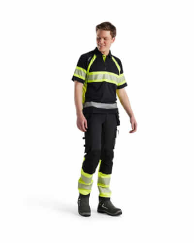 Blaklader 3338 fluo geel/zwart poloshirt op model