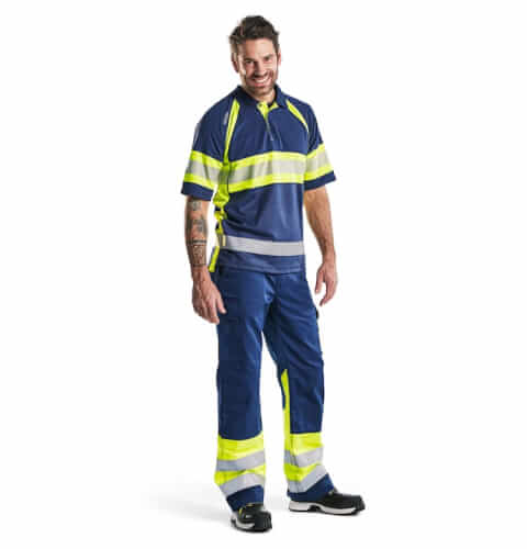Blaklader 3338 fluo geel blauw poloshirt op model