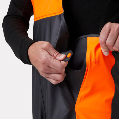 Helly Hansen 70596 Alna 2.0 fluo oranje regenbroek met bretels taille sluiting